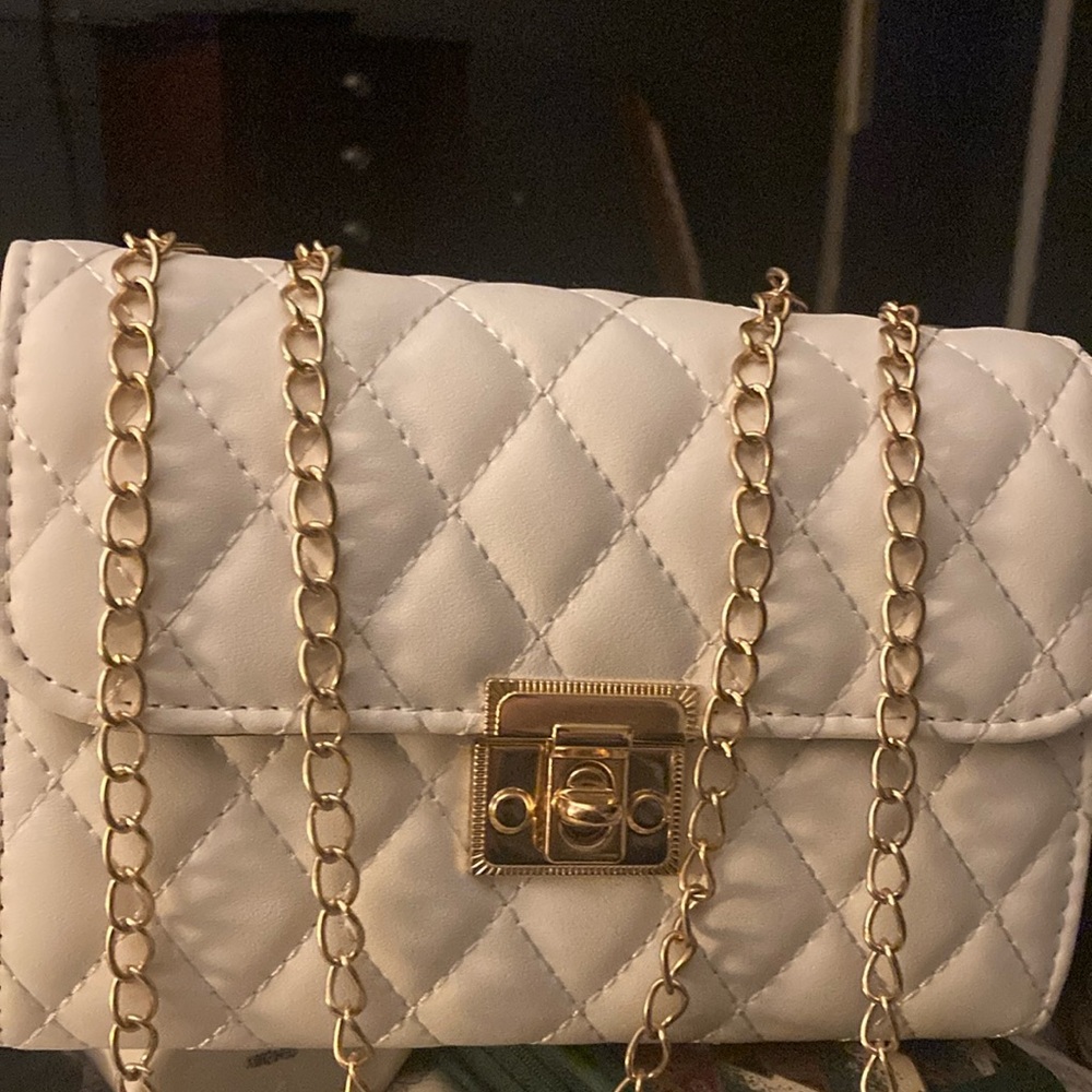 Elegant white clutch purse with chain straps